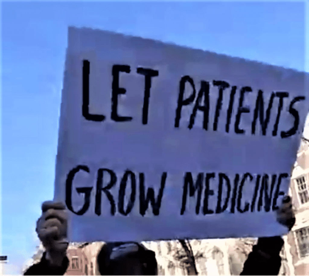 Advocates cannabis NJ grow right nj statehouse New Jersey medical cannabis home cultivation Homegrow protest sign displayed